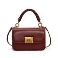Burgundy leather handbag with woven handle and gold pyramid stud square buckle - Red
