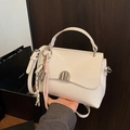 White leather handbag with silver semi-circle buckle and woven rope pendant strap - No Pendant / Off White