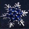 Elegant silver snowflake stud earrings with vibrant deep blue round cut gemstones - Blue Rhinestone Style / Blue