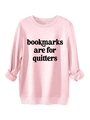 Detail of pink sweatshirt cuff and 'Bookmarks Are For Quitters' print on fabric - Pink