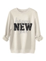 Detail of sequined black NEW text on ivory long sleeve sweatshirt with holiday print - S / Sand