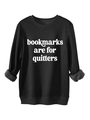 Detail of black fleece sweatshirt showing the soft inner lining and ribbed sleeve cuffs - Black