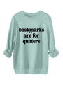 Detail of mint green sweatshirt featuring bookmarks are for quitters bold print - Light Green