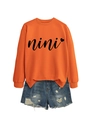 Detail of orange crewneck nini heart sweatshirt and distressed denim shorts set - S / Orange (Black Font)