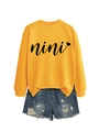 Detail of yellow nini heart sweatshirt and distressed denim shorts flat lay - S / Yellow (Black Font)