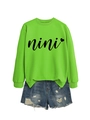 Detail view of neon green crewneck sweatshirt with nini heart print and denim shorts - S / Neon Green (Black Font)
