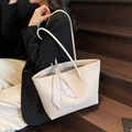 Minimalist beige contrast tote bag with geometric silk scarf detail on model - Off White