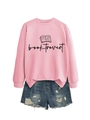 Detail of pink crewneck sweatshirt with booktrovert print and distressed denim shorts - S / Pink (Black Font)