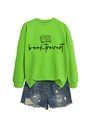 Flat lay of a vibrant green Booktrovert crewneck sweatshirt with distressed denim shorts - S / Fluorescent Green (Black Font)