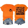 Detail view of cotton t-shirt with 'I CAN'T MY KID HAS PRACTICE' print and denim shorts - Orange (Black Font)