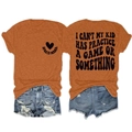 Detail of orange sports mama graphic t-shirt with back text and distressed denim shorts - Burnt Orange (Black Font)