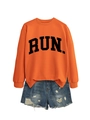 Detailed flat lay of orange crewneck sweatshirt with RUN text and distressed denim shorts - Orange (Black Font)