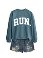 Detail of greyish-blue RUN sweatshirt with ribbed cuffs and distressed denim shorts - Blue (White Font)