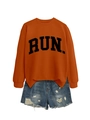 Flat lay detail of orange sweatshirt with RUN print and distressed denim shorts - Burnt Orange (Black Font)