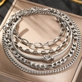 Detail of silver chain bracelet set featuring curb and box links with a knotted cuff - Silver Bracelet Set (N9122)