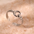 Minimalist silver-toned adjustable ring with crescent and chain texture on stone background - Silver Crescent Moon Chain Design (C3370)