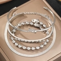 Silver-toned 4-piece bracelet set with heart pendant and minimalist open bangles - Silver 4-Piece Bracelet Set (C5294)