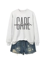 Flat lay detail of grey cotton sweatshirt with CARE coordinator print and denim shorts - Off White (Black Print)