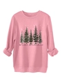 Detail of pink sweatshirt cuff and hem featuring black winter forest and snowflake prints - Peach