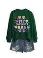 Detail of dark green crewneck sweatshirt with heart graphics and ripped denim shorts - Dark Green