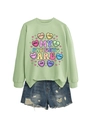 Detailed shot of mint green sweatshirt with medical theme hearts and denim shorts - Olive Green