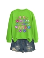 Flat lay of bright green crewneck sweatshirt with illustration and distressed denim shorts - Fluorescent Green