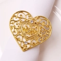 Macro detail of golden heart napkin ring with hollow pattern and sparkling rhinestones - Alloy Rhinestone Heart Style
