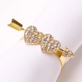 Gouden hart servetring met Cupido-pijl en strass voor tafeldecoratie - Cupido Hart