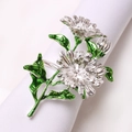 Rond de serviette marguerite en métal argenté avec feuilles en émail vert pour table - Argenté