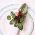 Close-up of Christmas napkin ring featuring pine cones, red berries and burlap loop - Red Berry Pine Needle Cone Burlap Style