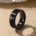 Polished black stainless steel signet ring featuring a silver brushed metal letter T design - Letter T