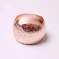 Elegant rose gold napkin ring with embossed floral pattern and polished metallic finish - Rose Relief Rose Gold / Rose Gold