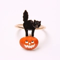 Servilletero de Halloween con gato negro y calabaza naranja sobre base de metal dorado - Gato Negro Calabaza