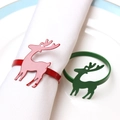 Christmas reindeer napkin ring set in festive red and green on white napkin - Elk