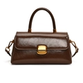 Minimalist dark brown polished leather handbag with elegant gold hardware and top handle - Brown
