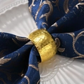 Golden drum-shaped napkin ring with embossed rose patterns on a blue fabric - Rose Pattern (Gold) / Gold