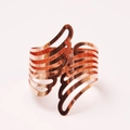 Rose gold napkin ring featuring a hollow feather wing design and polished finish - Rose Gold