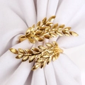 Elegant gold leaf napkin ring with detailed wheat ear design on a white cloth - Gold Leaf (ZWZ-PNR-913)