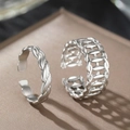 Macro shot of silver-tone twisted rope and geometric hollow cutout open rings for women - Silver Two-piece Set (C7328)