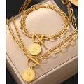 Detail of vintage gold coin necklace and bracelet set with T-bar closure and coin charms - Gold Color Style (C5623)