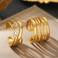 Detailed view of layered gold-plated stainless steel rings with woven and parallel designs - Gold Set (C7101)