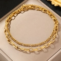 Bracelet de cheville double couche en acier doré sur coffret à bijoux élégant - Style Double Couche Doré (C5981)