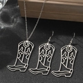Detail of western star cowboy boot pendant necklace and earrings on black leather - Silver (B3018)