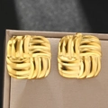 Detailed close-up of square gold stud earrings with textured woven relief patterns - Gold Woven Style (C5439)
