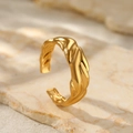 Close-up of a wide geometric 18K gold plated ring with irregular forged wavy texture - Golden Irregular Forged Wave Style (C2091)