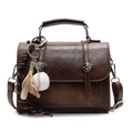 Brown retro PU leather crossbody bag with vintage metal buckle and baseball keychain - With Pendant / Brown