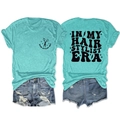 Detail of teal short-sleeve T-shirt with IN MY HAIR STYLIST ERA print and denim shorts - S / Tops / Deep Water Blue
