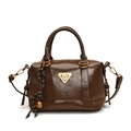 Brown glossy leather Boston handbag with gold logo and decorative bell pendant - Brown