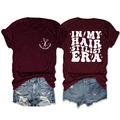 Flat lay of wine red hairstylist t-shirt and distressed denim shorts, showing both sides - S / Tops / Wine Red (White Font)