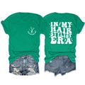 Front and back view of a green hair stylist t-shirt set with blue denim shorts - S / Tops / Dark Green